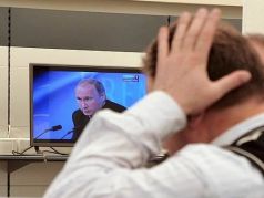 Телевизор и выступление Путина. Фото: www.facebook.com/profile.php?id=100010560969309